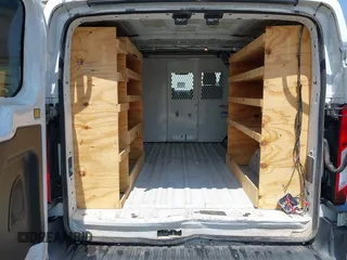 2016 Ford Transit Cargo with VIN 1FTYE1ZM1GKB27189, listed as a IAAI auction lot 40110239 with 131,106 mi miles and . Bid and sale history available at carsss.com. Image 16.