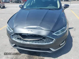2020 Ford Fusion Titanium with VIN 3FA6P0D9XLR131042, listed as a IAAI auction lot 42560444 with 95,351 mi miles and . Bid and sale history available at DreamBid. Image 6.