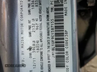 2012 Mazda 3 i Sport z VIN JM1BL1UF9C1587155, wystawiony jako Copart lot #59013105 z przebiegiem 188 233 mil mil oraz Szkoda całkowita • Salvage title. Historia ofert i sprzedaży dostępna na DreamBid. Obrazek 12.