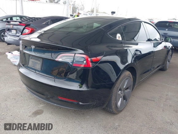 2023 Tesla Model 3 with VIN 5YJ3E1EA7PF473749, listed as a IAAI auction lot 41921478 with 21,483 mi miles and . Bid and sale history available at DreamBid. Image 4.