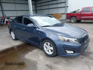 2015 Kia Optima LX z VIN KNAGM4A70F5543976, wystawiony jako IAAI lot #42403971 z przebiegiem 256 520 mil mil oraz . Historia ofert i sprzedaży dostępna na DreamBid. Obrazek 1.