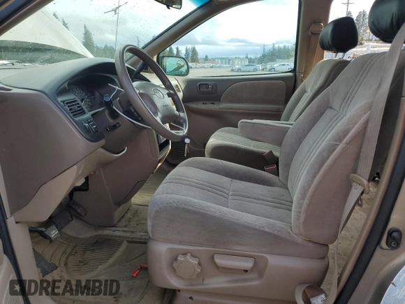 1999 Toyota Sienna LE with VIN 4T3ZF13C0XU133039, listed as a Copart auction lot 51162645 with 182,318 mi miles and Salvage Title. Bid and sale history available at carsss.com. Image 7.