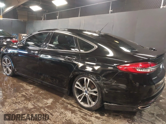 2017 Ford Fusion Titanium with VIN 3FA6P0D93HR197617, listed as a IAAI auction lot 41673022 with 65,041 mi miles and . Bid and sale history available at DreamBid. Image 6.