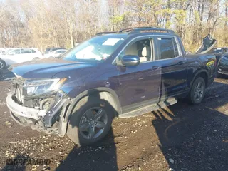 2023 Honda Ridgeline RTL with VIN 5FPYK3F54PB028484, listed as a IAAI auction lot 41093332 with 47,924 mi miles. Bid and sale history available at carsss.com. Image 17.