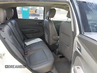 2015 Chevrolet Sonic LTZ z VIN 1G1JE6SB1F4164892, wystawiony jako IAAI lot #42359377 z przebiegiem 104 248 mil mil oraz . Historia ofert i sprzedaży dostępna na DreamBid. Obrazek 8.