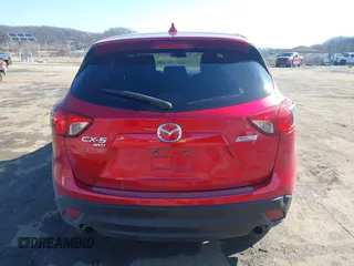 2016 Mazda CX-5 Touring with VIN JM3KE4CY4G0860035, listed as a IAAI auction lot 41678299 with 72,101 mi miles. Bid and sale history available at carsss.com. Image 16.