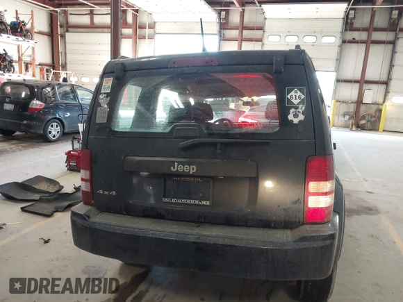 2012 Jeep Liberty Sport z VIN 1C4PJMAK9CW158308, wystawiony jako IAAI lot #41665502 z przebiegiem 125 595 mil mil oraz . Historia ofert i sprzedaży dostępna na DreamBid. Obrazek 16.