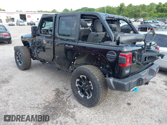 2024 Jeep Wrangler Rubicon X z VIN 1C4RJXR64RW197186, wystawiony jako IAAI lot #42405700 z przebiegiem 6 397 mil mil oraz . Historia ofert i sprzedaży dostępna na DreamBid. Obrazek 3.
