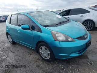 2013 Honda Fit with VIN JHMGE8H36DC023041, listed as a IAAI auction lot 41144523 with 121,307 mi miles. Bid and sale history available at carsss.com. Image 1.