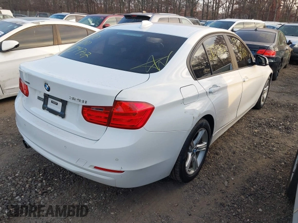 2014 BMW 3 Series 328i xDrive with VIN WBA3B5C52EF958635, listed as a IAAI auction lot 40916777 with 143,975 mi miles. Bid and sale history available at carsss.com. Image 4.