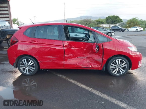 2016 Honda Fit EX with VIN JHMGK5H71GS004370, listed as a IAAI auction lot 41725560 with 67,493 mi miles and . Bid and sale history available at DreamBid. Image 13.