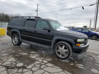 2002 Chevrolet Suburban Z71 with VIN 3GNFK16Z72G295734, listed as a Copart auction lot 45763225 with 197,205 mi miles and Salvage Title. Bid and sale history available at carsss.com. Image 4.