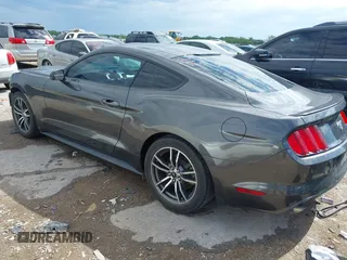 2017 Ford Mustang EcoBoost with VIN 1FA6P8TH2H5344116, listed as a IAAI auction lot 42066828 with 99,956 mi miles and . Bid and sale history available at DreamBid. Image 3.