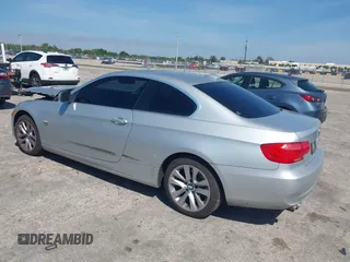 2013 BMW 3 Series 328i xDrive with VIN WBAKF5C50DJ297831, listed as a IAAI auction lot 41894859 with 87,174 mi miles. Bid and sale history available at carsss.com. Image 3.