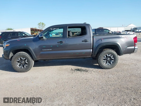 2017 Toyota Tacoma SR5 with VIN 5TFCZ5AN5HX077315, listed as a IAAI auction lot 42017639 with 74,999 mi miles and . Bid and sale history available at DreamBid. Image 14.