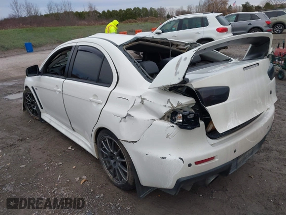 2014 Mitsubishi Lancer Evolution GSR with VIN JA32W8FV5EU012572, listed as a IAAI auction lot 40871463 with 89,529 mi miles. Bid and sale history available at carsss.com. Image 3.