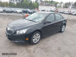 2014 Chevrolet Cruze LS with VIN 1G1PB5SG2E7366520, listed as a IAAI auction lot 42034644 with 163,065 mi miles. Bid and sale history available at carsss.com. Image 2.