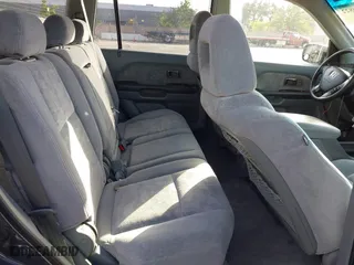 2004 Honda Pilot EX with VIN 2HKYF18414H589485, listed as a IAAI auction lot 42100822 with 172,254 mi miles. Bid and sale history available at carsss.com. Image 8.