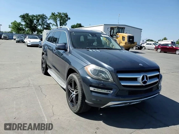 2014 Mercedes-Benz GL 450 with VIN 4JGDF7CE1EA278029, listed as a Copart auction lot 55501885 with 143,250 mi miles and Salvage title. Bid and sale history available at DreamBid. Image 14.