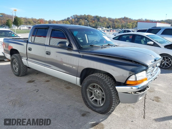 2001 Dodge Dakota Sport with VIN 1B7HL2AN21S319390, listed as a IAAI auction lot 40836729 with 118,823 mi miles. Bid and sale history available at carsss.com. Image 1.