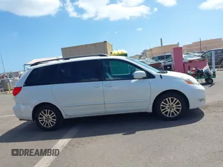 2010 Toyota Sienna XLE with VIN 5TDYK4CC7AS291119, listed as a IAAI auction lot 41742917 with 201,590 mi miles. Bid and sale history available at carsss.com. Image 13.