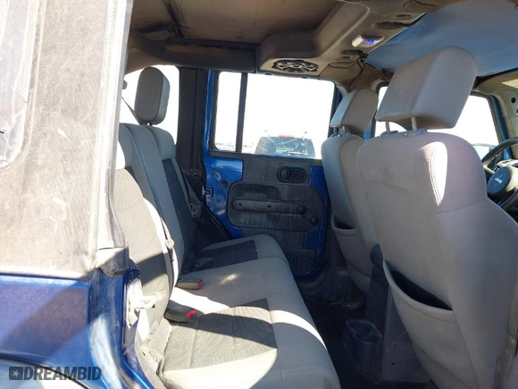 2010 Jeep Wrangler Unlimited Sport with VIN 1J4BA3H19AL197779, listed as a IAAI auction lot 41620455 with 161,697 mi miles. Bid and sale history available at carsss.com. Image 8.
