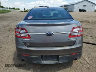 2013 Ford Taurus Limited z VIN 1FAHP2F81DG229944, wystawiony jako Copart lot #63218315 z przebiegiem 199 897 mil mil oraz Czysty tytuł • Clean title. Historia ofert i sprzedaży dostępna na DreamBid. Obrazek 6.