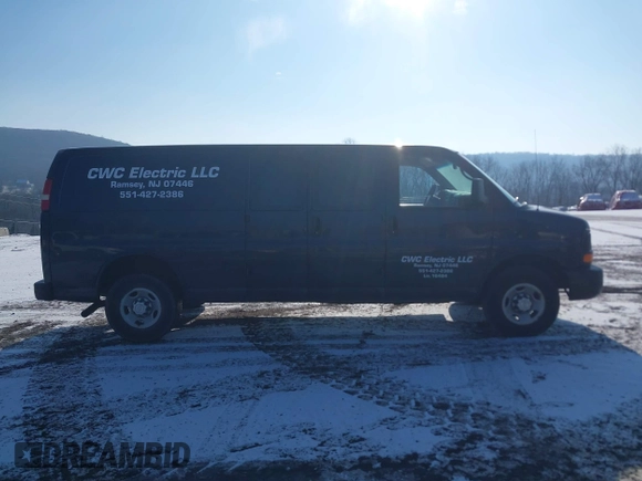 2014 Chevrolet Express Cargo Van with VIN 1GCWGGBA5E1205786, listed as a IAAI auction lot 41339085 with 201,460 mi miles. Bid and sale history available at carsss.com. Image 13.