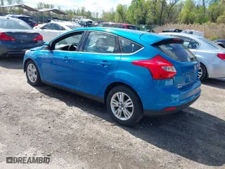 2012 Ford Focus SEL with VIN 1FAHP3M2XCL433751, listed as a IAAI auction lot 42055131 with 90,114 mi miles. Bid and sale history available at carsss.com. Image 3.