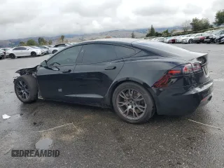 2024 Tesla Model S with VIN 5YJSA1E54RF536092, listed as a Copart auction lot 85934334 with 11,451 mi miles and Salvage title. Bid and sale history available at DreamBid. Image 2.
