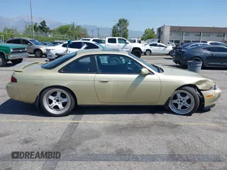 1995 Nissan 240SX z VIN JN1AS44D3SW013539, wystawiony jako IAAI lot #42291213 z przebiegiem 198 479 mil mil oraz . Historia ofert i sprzedaży dostępna na DreamBid. Obrazek 13.