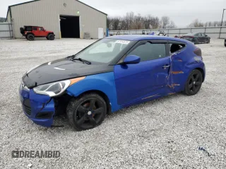 2013 Hyundai Veloster w/Black Int z VIN KMHTC6AD1DU177207, wystawiony jako Copart lot #87914575 z przebiegiem 143 621 mil mil oraz Szkoda całkowita • Salvage title. Historia ofert i sprzedaży dostępna na DreamBid. Obrazek 1.