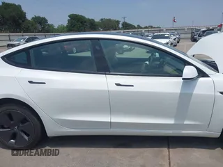 2023 Tesla Model 3 z VIN 5YJ3E1EA3PF604076, wystawiony jako IAAI lot #42181964 z przebiegiem 23 207 mil mil oraz . Historia ofert i sprzedaży dostępna na DreamBid. Obrazek 13.