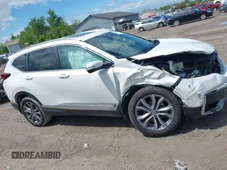 2020 Honda CR-V Touring z VIN 2HKRW2H97LH676151, wystawiony jako IAAI lot #42340956 z przebiegiem 32 492 mil mil oraz . Historia ofert i sprzedaży dostępna na DreamBid. Obrazek 13.