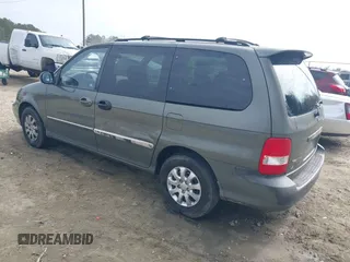 2004 Kia Sedona LX with VIN KNDUP131546543841, listed as a IAAI auction lot 41541012 with 112,122 mi miles. Bid and sale history available at carsss.com. Image 3.