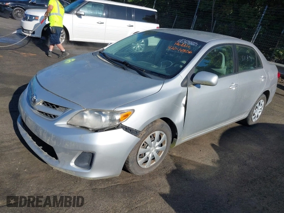 2011 Toyota Corolla L with VIN 2T1BU4EE9BC713402, listed as a IAAI auction lot 42044806 with 121,894 mi miles. Bid and sale history available at carsss.com. Image 2.