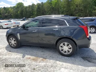 2015 Cadillac SRX Luxury Collection z VIN 3GYFNBE31FS598363, wystawiony jako Copart lot #55766975 z przebiegiem 62 103 mil mil oraz Szkody całkowita. Historia ofert i sprzedaży dostępna na DreamBid. Obrazek 2.
