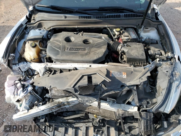 2014 Lincoln MKZ z VIN 3LN6L2G90ER820731, wystawiony jako Copart lot #57818185 z przebiegiem 133 133 mil mil oraz Szkoda całkowita • Salvage title. Historia ofert i sprzedaży dostępna na DreamBid. Obrazek 11.