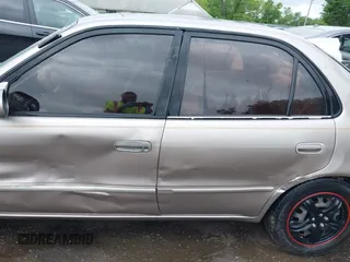 1999 Toyota Corolla VE with VIN 2T1BR12E9XC204275, listed as a IAAI auction lot 42231622 with 180,732 mi miles and . Bid and sale history available at DreamBid. Image 14.