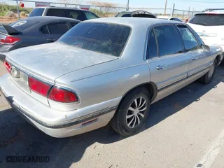 1999 Buick LeSabre Custom with VIN 1G4HP52KXXH500765, listed as a IAAI auction lot 42048182 with 276,575 mi miles. Bid and sale history available at carsss.com. Image 4.