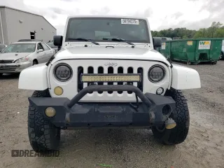 2013 Jeep Wrangler Sahara with VIN 1C4AJWBG8DL691619, listed as a Copart auction lot 56194275 with 103,299 mi miles and Salvage title. Bid and sale history available at DreamBid. Image 5.