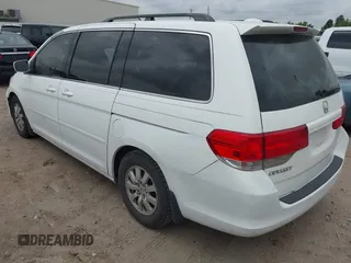 2010 Honda Odyssey EX-L z VIN 5FNRL3H78AB030254, wystawiony jako IAAI lot #42742510 z przebiegiem 277 913 mil mil oraz . Historia ofert i sprzedaży dostępna na DreamBid. Obrazek 3.