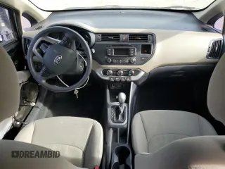 2014 Kia Rio LX with VIN KNADM4A36E6370196, listed as a Copart auction lot 52152155 with 123,672 mi miles and Salvage Title. Bid and sale history available at DreamBid. Image 8.