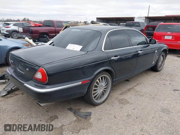 2007 Jaguar XJ with VIN SAJXA73C97TH14362, listed as a IAAI auction lot 41305716 with 120,924 mi miles and . Bid and sale history available at DreamBid. Image 4.