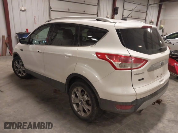 2014 Ford Escape Titanium with VIN 1FMCU9J9XEUE26857, listed as a IAAI auction lot 41552186 with 142,045 mi miles. Bid and sale history available at carsss.com. Image 3.