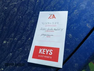 2021 Tesla Model Y Standard Range z VIN 5YJYGDED6MF107711, wystawiony jako IAAI lot #41794384 z przebiegiem 86 934 mil mil oraz . Historia ofert i sprzedaży dostępna na DreamBid. Obrazek 11.