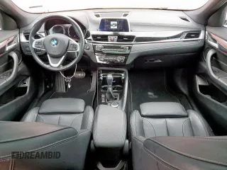 2018 BMW X2 sDrive28i with VIN WBXYJ3C37JEJ75893, listed as a Copart auction lot 62513565 with 62,029 mi miles and Salvage title. Bid and sale history available at DreamBid. Image 8.