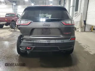 2019 Jeep Cherokee Trailhawk with VIN 1C4PJMBXXKD362555, listed as a Copart auction lot 88888565 with 120,673 mi miles and Salvage Title. Bid and sale history available at DreamBid. Image 6.