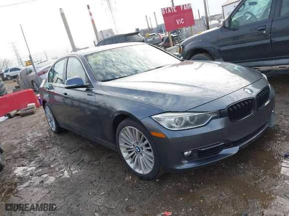 2014 BMW 3 Series 335i xDrive with VIN WBA3B9C53EF588061, listed as a IAAI auction lot 41652035 with 123,345 mi miles. Bid and sale history available at carsss.com. Image 1.