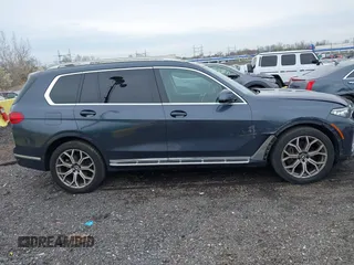 2020 BMW X7 xDrive40i z VIN 5UXCW2C03L9B38605, wystawiony jako IAAI lot #42026801 z przebiegiem 82 394 mil mil oraz . Historia ofert i sprzedaży dostępna na DreamBid. Obrazek 13.